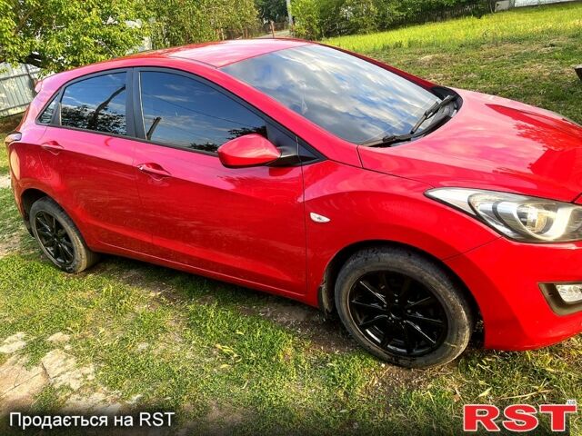 Червоний Хендай i30, об'ємом двигуна 1.4 л та пробігом 148 тис. км за 7400 $, фото 1 на Automoto.ua