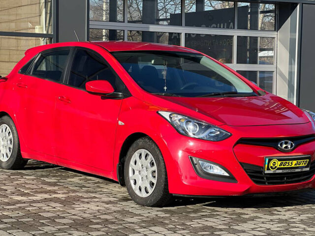Красный Хендай i30, объемом двигателя 1.4 л и пробегом 69 тыс. км за 11990 $, фото 1 на Automoto.ua
