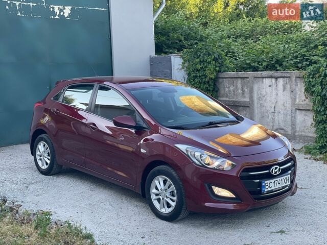 Червоний Хендай i30, об'ємом двигуна 1.59 л та пробігом 84 тис. км за 13650 $, фото 1 на Automoto.ua
