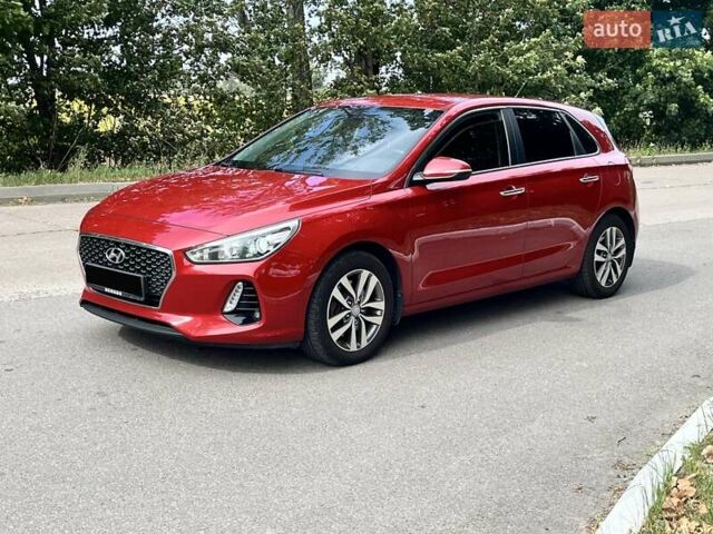 Красный Хендай i30, объемом двигателя 1.6 л и пробегом 111 тыс. км за 15200 $, фото 1 на Automoto.ua