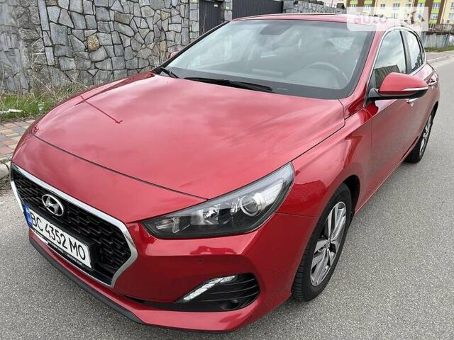 Красный Хендай i30, объемом двигателя 1.4 л и пробегом 61 тыс. км за 15900 $, фото 1 на Automoto.ua