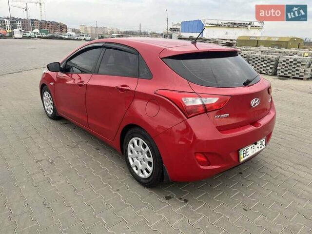 Червоний Хендай i30, об'ємом двигуна 1.4 л та пробігом 242 тис. км за 7300 $, фото 1 на Automoto.ua