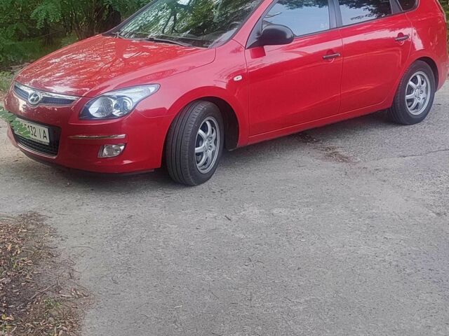 Червоний Хендай i30, об'ємом двигуна 1.6 л та пробігом 217 тис. км за 4950 $, фото 1 на Automoto.ua