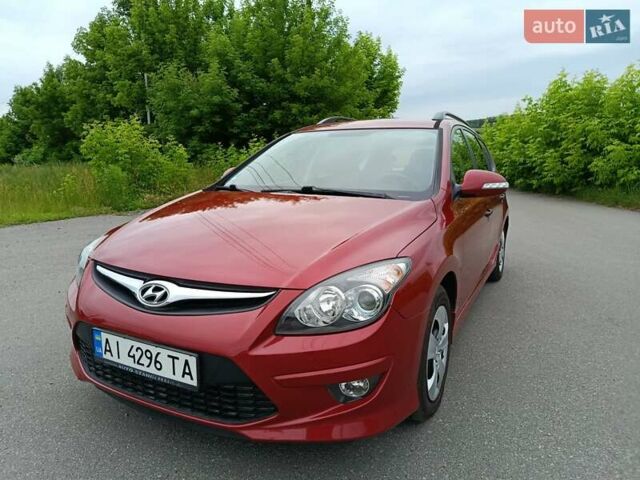 Красный Хендай i30, объемом двигателя 1.4 л и пробегом 149 тыс. км за 7200 $, фото 1 на Automoto.ua