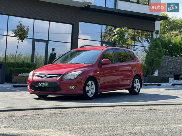 Красный Хендай i30, объемом двигателя 1.4 л и пробегом 338 тыс. км за 4700 $, фото 1 на Automoto.ua