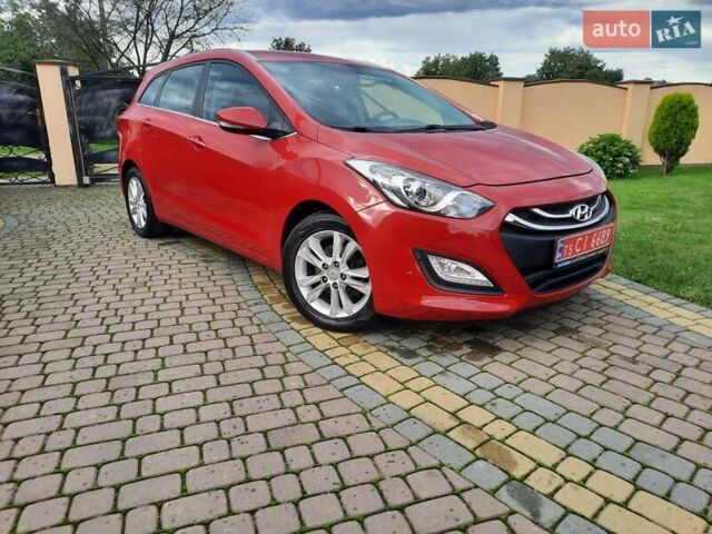 Червоний Хендай i30, об'ємом двигуна 1.6 л та пробігом 125 тис. км за 9250 $, фото 1 на Automoto.ua