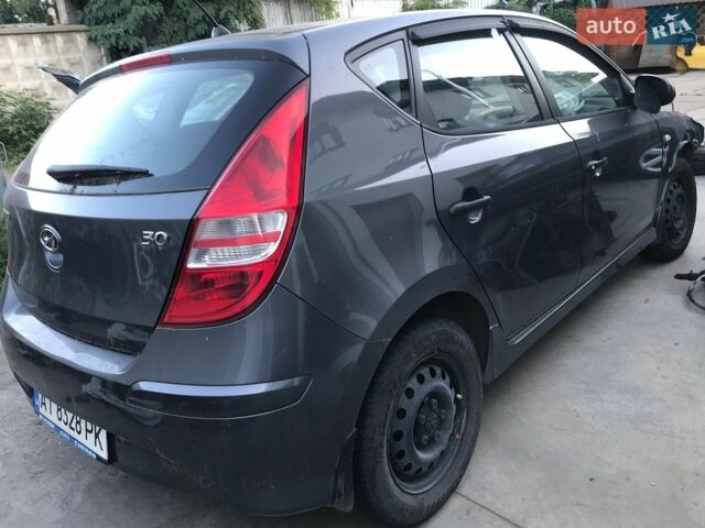 Сірий Хендай i30, об'ємом двигуна 1.4 л та пробігом 128 тис. км за 2040 $, фото 1 на Automoto.ua
