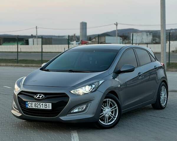Сірий Хендай i30, об'ємом двигуна 1.4 л та пробігом 212 тис. км за 7300 $, фото 1 на Automoto.ua