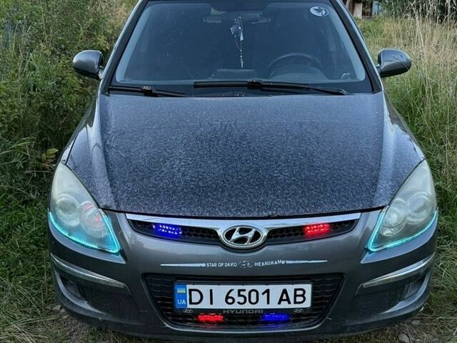 Серый Хендай i30, объемом двигателя 1.6 л и пробегом 247 тыс. км за 5100 $, фото 1 на Automoto.ua