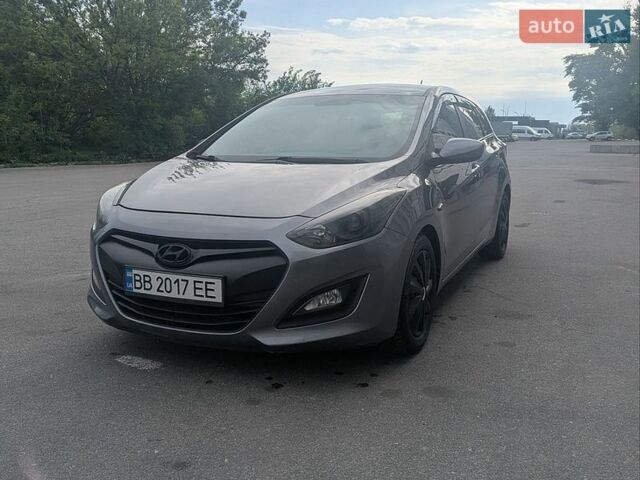 Серый Хендай i30, объемом двигателя 1.4 л и пробегом 97 тыс. км за 8500 $, фото 1 на Automoto.ua