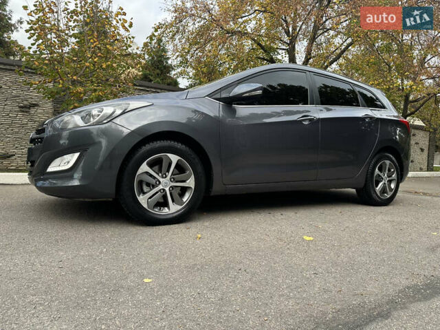 Сірий Хендай i30, об'ємом двигуна 1.58 л та пробігом 150 тис. км за 9800 $, фото 1 на Automoto.ua