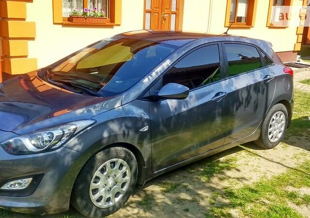 Сірий Хендай i30, об'ємом двигуна 1.4 л та пробігом 35 тис. км за 11100 $, фото 1 на Automoto.ua