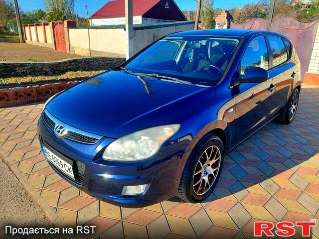 Синий Хендай i30, объемом двигателя 2 л и пробегом 217 тыс. км за 4750 $, фото 1 на Automoto.ua