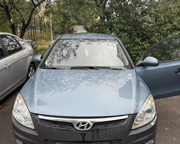 Синий Хендай i30, объемом двигателя 1.4 л и пробегом 124 тыс. км за 4500 $, фото 1 на Automoto.ua