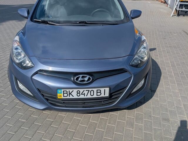 Синий Хендай i30, объемом двигателя 1.4 л и пробегом 79 тыс. км за 9400 $, фото 1 на Automoto.ua