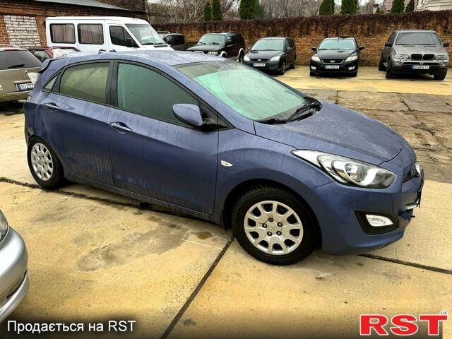 Синий Хендай i30, объемом двигателя 1.4 л и пробегом 91 тыс. км за 2900 $, фото 1 на Automoto.ua