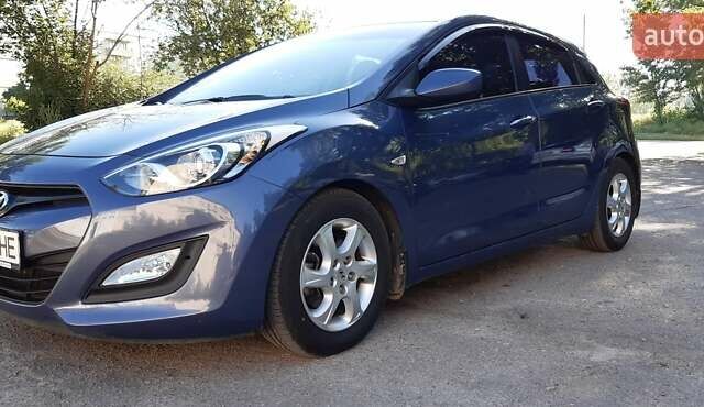 Синий Хендай i30, объемом двигателя 1.4 л и пробегом 97 тыс. км за 9600 $, фото 1 на Automoto.ua