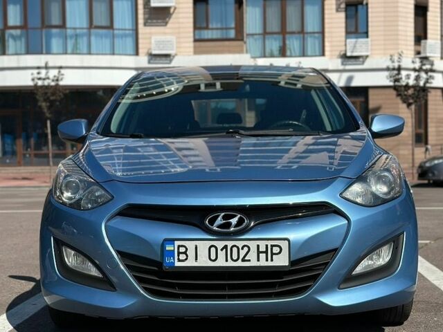 Синий Хендай i30, объемом двигателя 1.4 л и пробегом 195 тыс. км за 7849 $, фото 1 на Automoto.ua