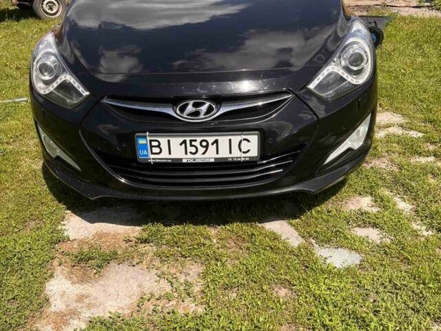 Черный Хендай и40, объемом двигателя 1.7 л и пробегом 215 тыс. км за 8800 $, фото 1 на Automoto.ua