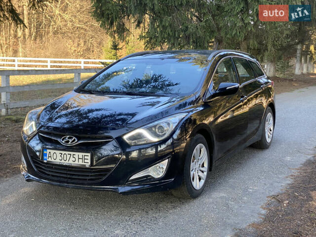 Черный Хендай и40, объемом двигателя 1.59 л и пробегом 238 тыс. км за 6450 $, фото 1 на Automoto.ua