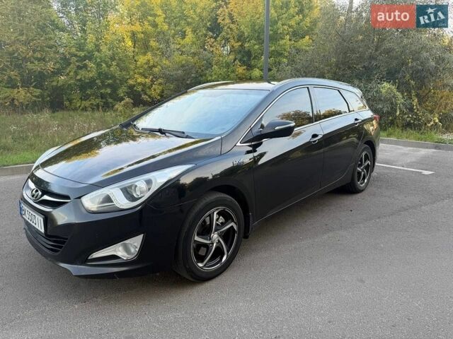 Черный Хендай и40, объемом двигателя 1.7 л и пробегом 300 тыс. км за 6950 $, фото 1 на Automoto.ua