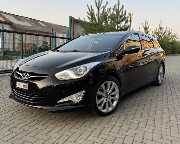 Чорний Хендай і40, об'ємом двигуна 1.7 л та пробігом 214 тис. км за 8999 $, фото 1 на Automoto.ua