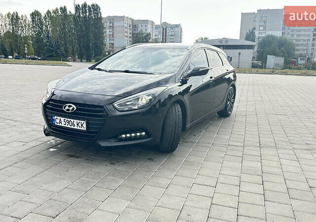 Черный Хендай и40, объемом двигателя 1.69 л и пробегом 207 тыс. км за 13500 $, фото 1 на Automoto.ua