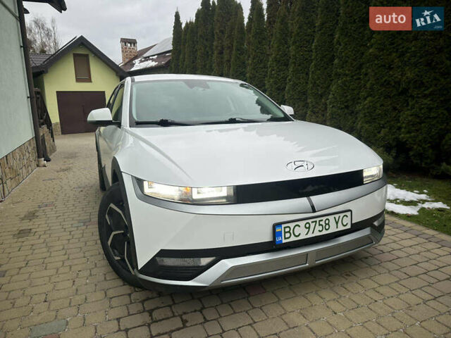 Белый Хендай Ioniq 5, объемом двигателя 0 л и пробегом 84 тыс. км за 23200 $, фото 1 на Automoto.ua