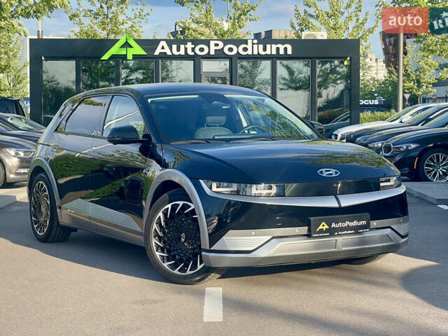 Черный Хендай Ioniq 5, объемом двигателя 0 л и пробегом 14 тыс. км за 27600 $, фото 1 на Automoto.ua