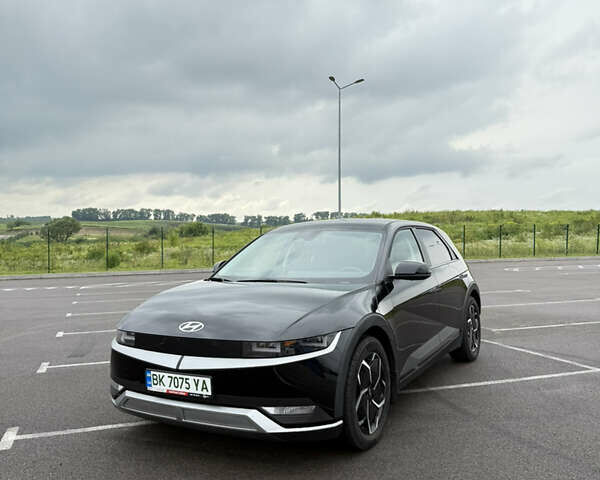 Черный Хендай Ioniq 5, объемом двигателя 0 л и пробегом 25 тыс. км за 28999 $, фото 1 на Automoto.ua