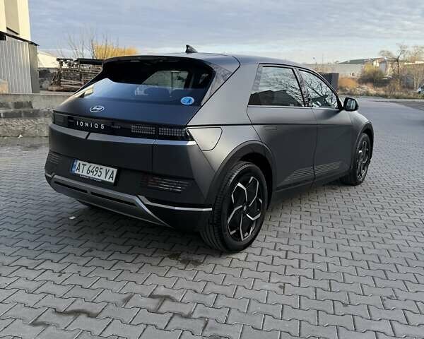 Серый Хендай Ioniq 5, объемом двигателя 0 л и пробегом 26 тыс. км за 25300 $, фото 1 на Automoto.ua