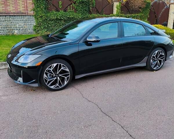 Зеленый Хендай IONIQ 6, объемом двигателя 0 л и пробегом 14 тыс. км за 26399 $, фото 1 на Automoto.ua