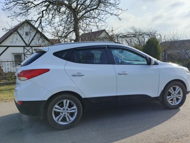 Білий Хендай іх35, об'ємом двигуна 2 л та пробігом 112 тис. км за 10300 $, фото 1 на Automoto.ua