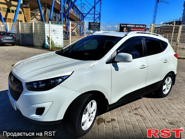Білий Хендай іх35, об'ємом двигуна 2.4 л та пробігом 260 тис. км за 10350 $, фото 1 на Automoto.ua