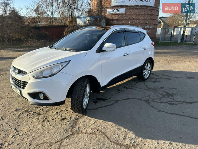 Білий Хендай іх35, об'ємом двигуна 2 л та пробігом 220 тис. км за 12600 $, фото 1 на Automoto.ua