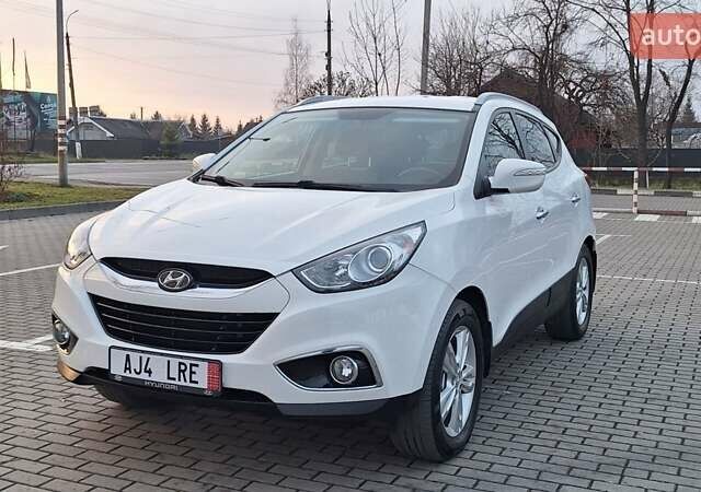 Білий Хендай іх35, об'ємом двигуна 2 л та пробігом 208 тис. км за 13999 $, фото 1 на Automoto.ua