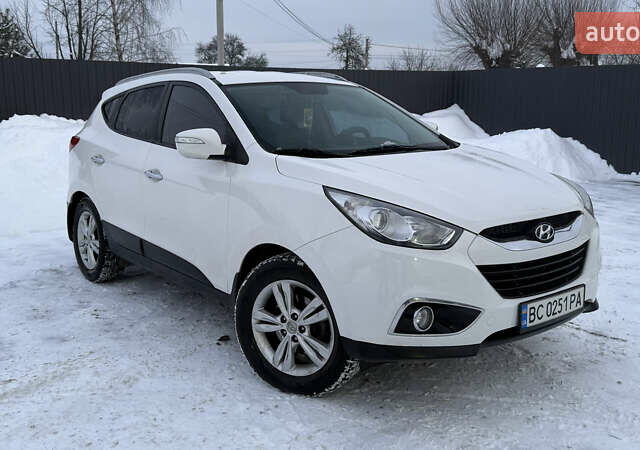 Білий Хендай іх35, об'ємом двигуна 2 л та пробігом 242 тис. км за 12750 $, фото 1 на Automoto.ua