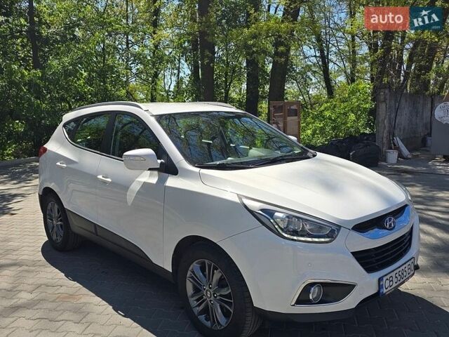 Білий Хендай іх35, об'ємом двигуна 2 л та пробігом 187 тис. км за 13500 $, фото 1 на Automoto.ua