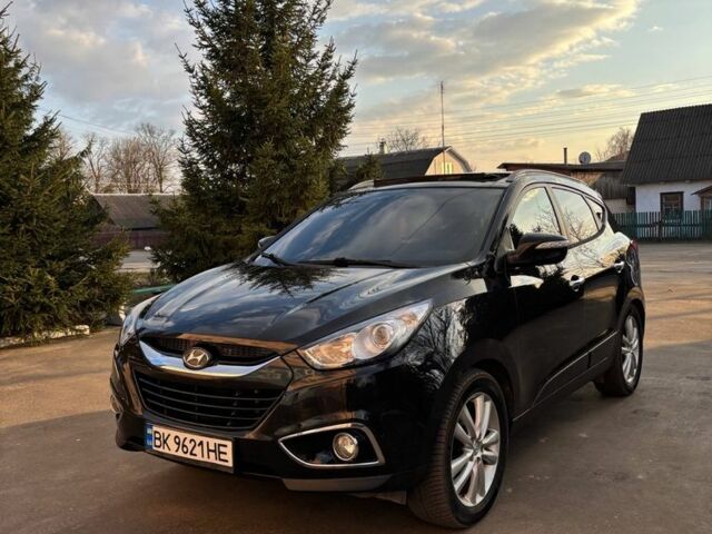 Чорний Хендай іх35, об'ємом двигуна 2 л та пробігом 296 тис. км за 11524 $, фото 1 на Automoto.ua