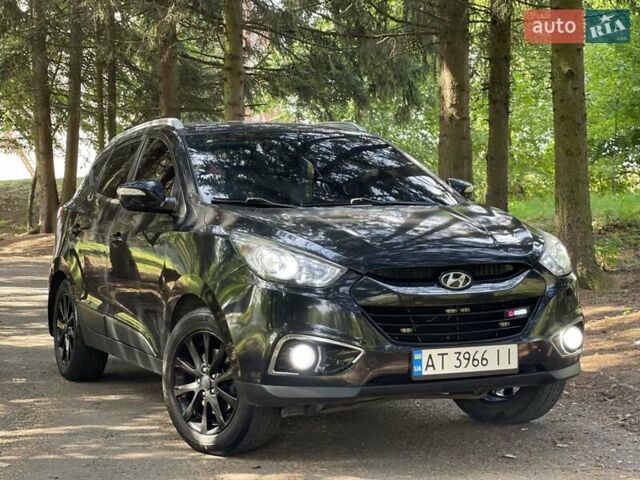 Чорний Хендай іх35, об'ємом двигуна 2 л та пробігом 287 тис. км за 10500 $, фото 1 на Automoto.ua