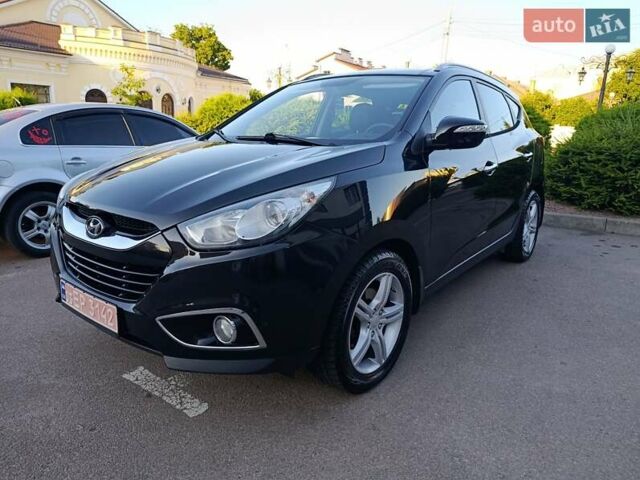 Черный Хендай их35, объемом двигателя 2 л и пробегом 235 тыс. км за 11500 $, фото 1 на Automoto.ua