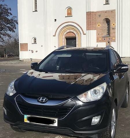 Чорний Хендай іх35, об'ємом двигуна 0 л та пробігом 165 тис. км за 13200 $, фото 1 на Automoto.ua