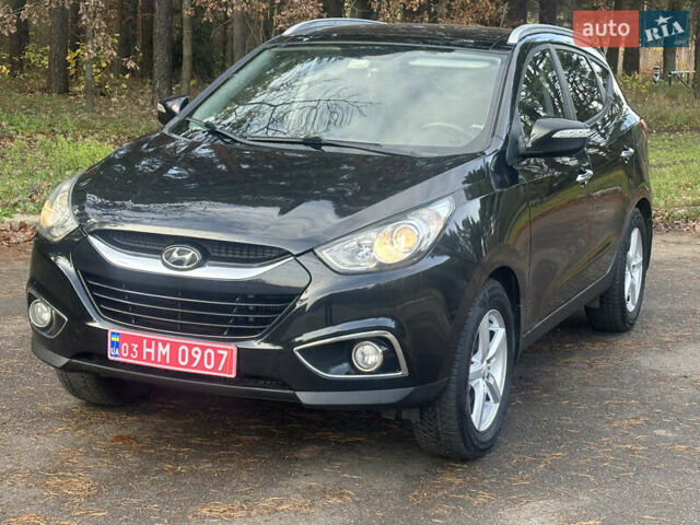 Черный Хендай их35, объемом двигателя 2 л и пробегом 240 тыс. км за 11900 $, фото 1 на Automoto.ua