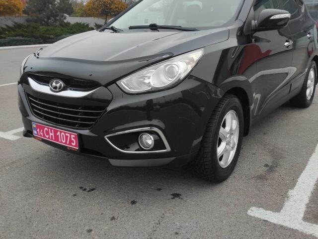 Черный Хендай их35, объемом двигателя 2 л и пробегом 249 тыс. км за 11900 $, фото 1 на Automoto.ua