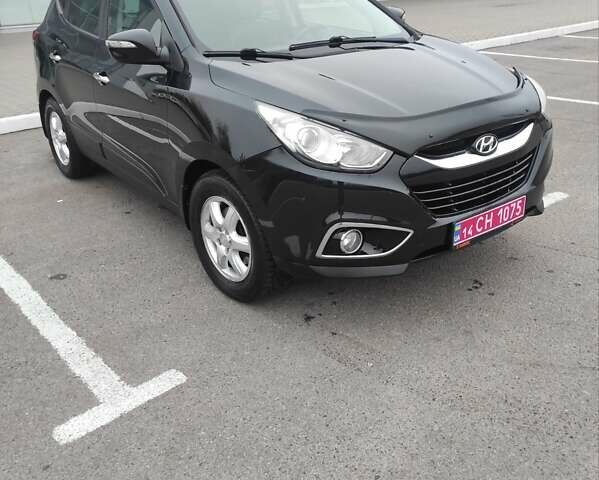 Черный Хендай их35, объемом двигателя 2 л и пробегом 249 тыс. км за 11900 $, фото 1 на Automoto.ua