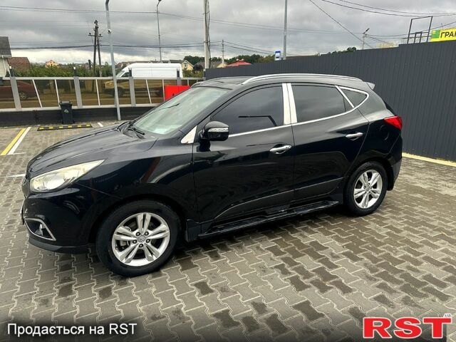 Чорний Хендай іх35, об'ємом двигуна 2 л та пробігом 116 тис. км за 10800 $, фото 1 на Automoto.ua