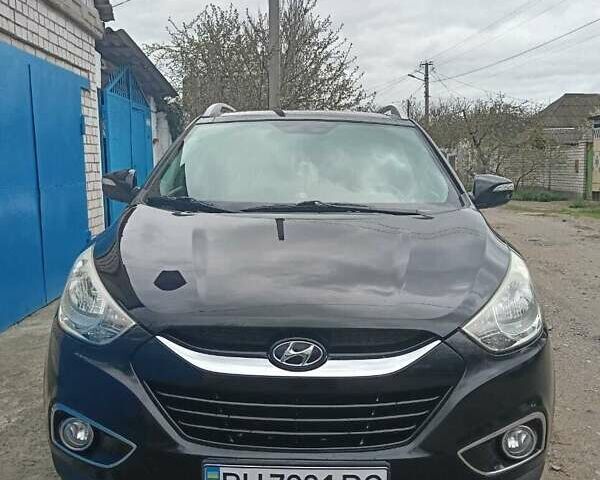 Черный Хендай их35, объемом двигателя 2 л и пробегом 190 тыс. км за 12800 $, фото 1 на Automoto.ua