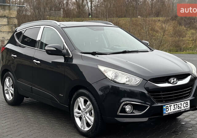 Черный Хендай их35, объемом двигателя 2 л и пробегом 178 тыс. км за 12350 $, фото 1 на Automoto.ua