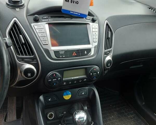 Черный Хендай их35, объемом двигателя 2 л и пробегом 230 тыс. км за 11300 $, фото 1 на Automoto.ua