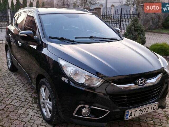 Черный Хендай их35, объемом двигателя 2 л и пробегом 264 тыс. км за 11900 $, фото 1 на Automoto.ua